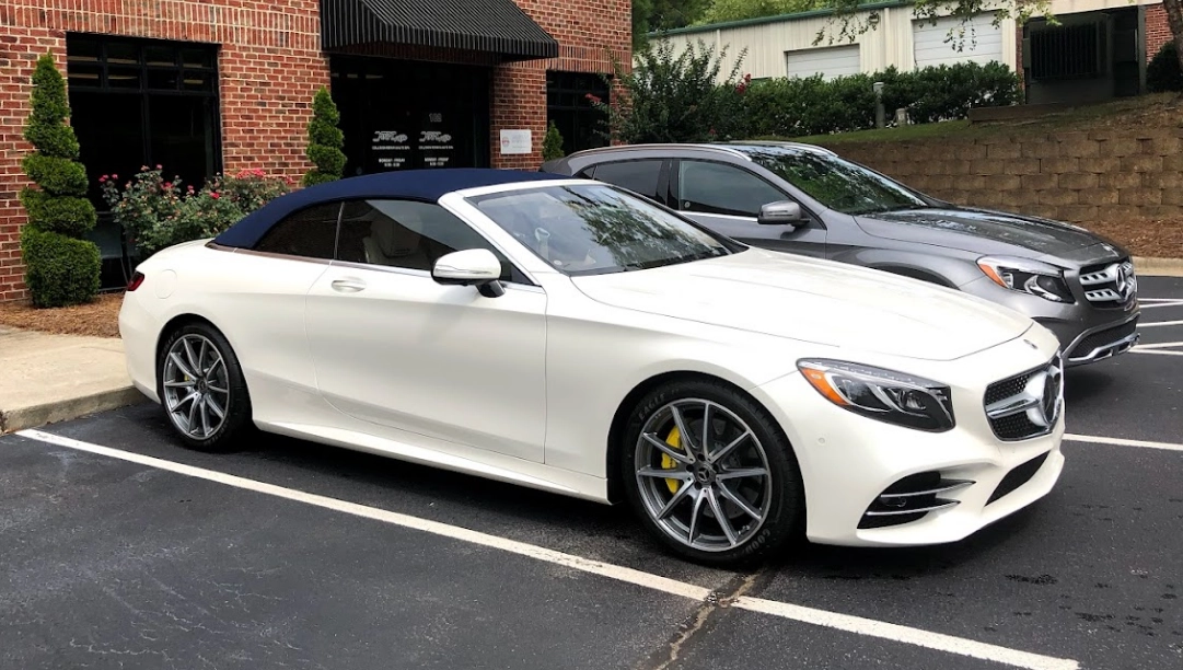 White Mercedes-Benz Convertable In Front of Xtreme Auto